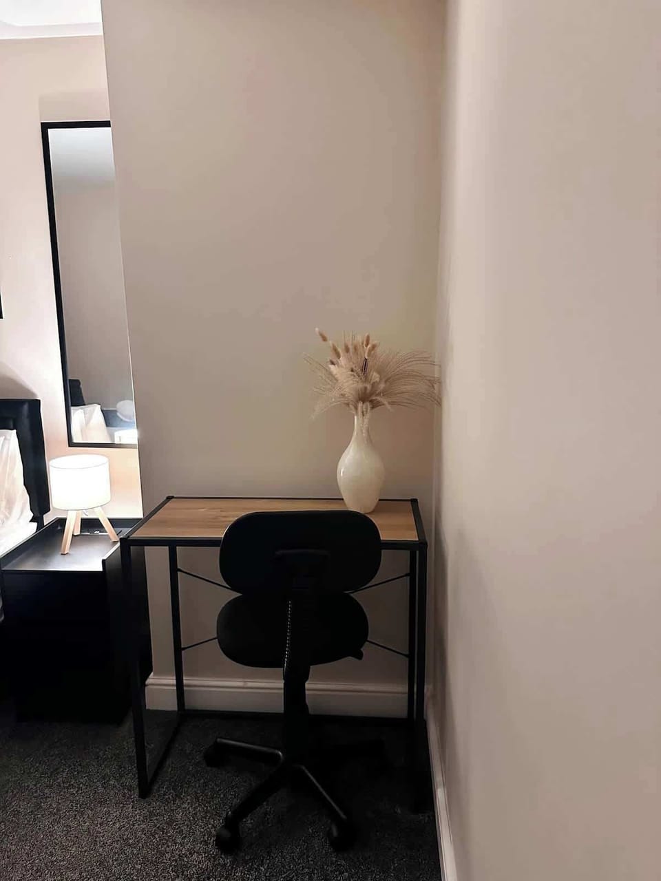 Work from home using this desk located in the bedroom