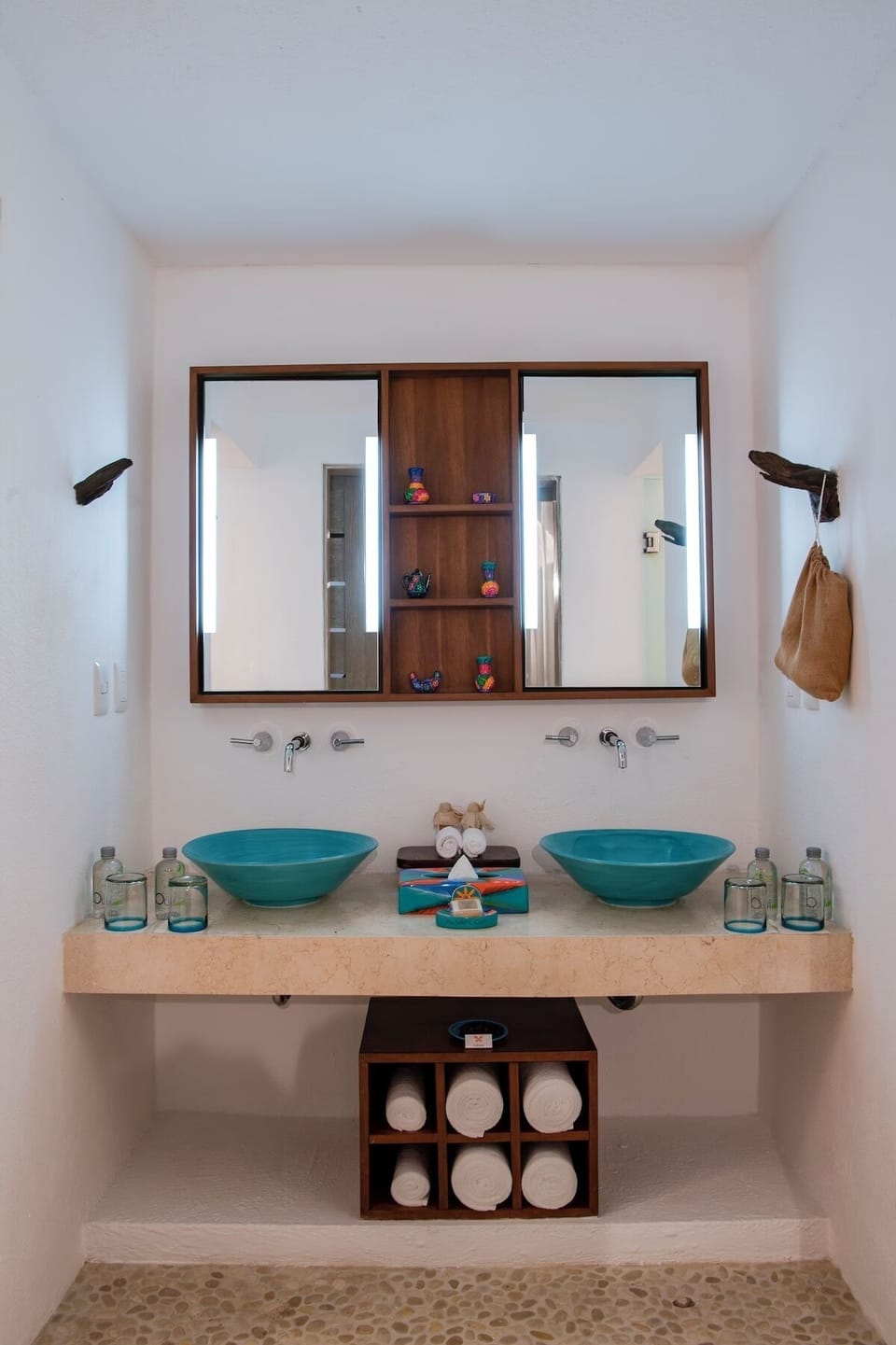 Refresh together at the double vanity with spa-like basin sinks.