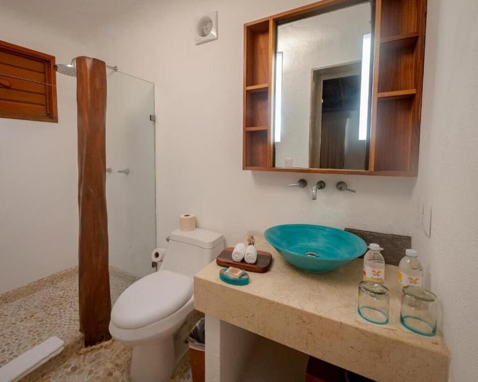 Rinse off comfortably in the bright shower after beach days.