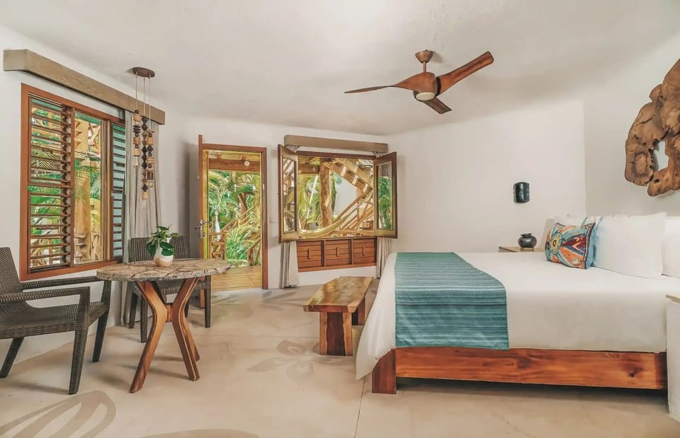 Wake up to tropical breezes with a cozy in-room table.