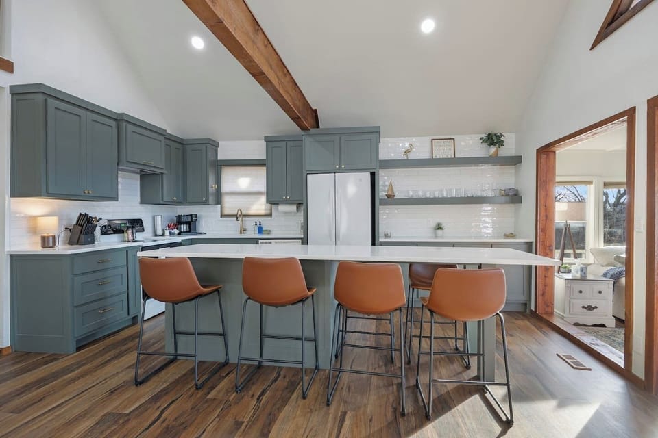 Fully stocked open concept kitchen, located on the entry level.  Island has seating for 6.