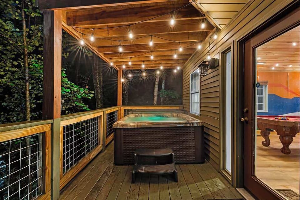 The hot tub faces the forest. You'll have peace and privacy.