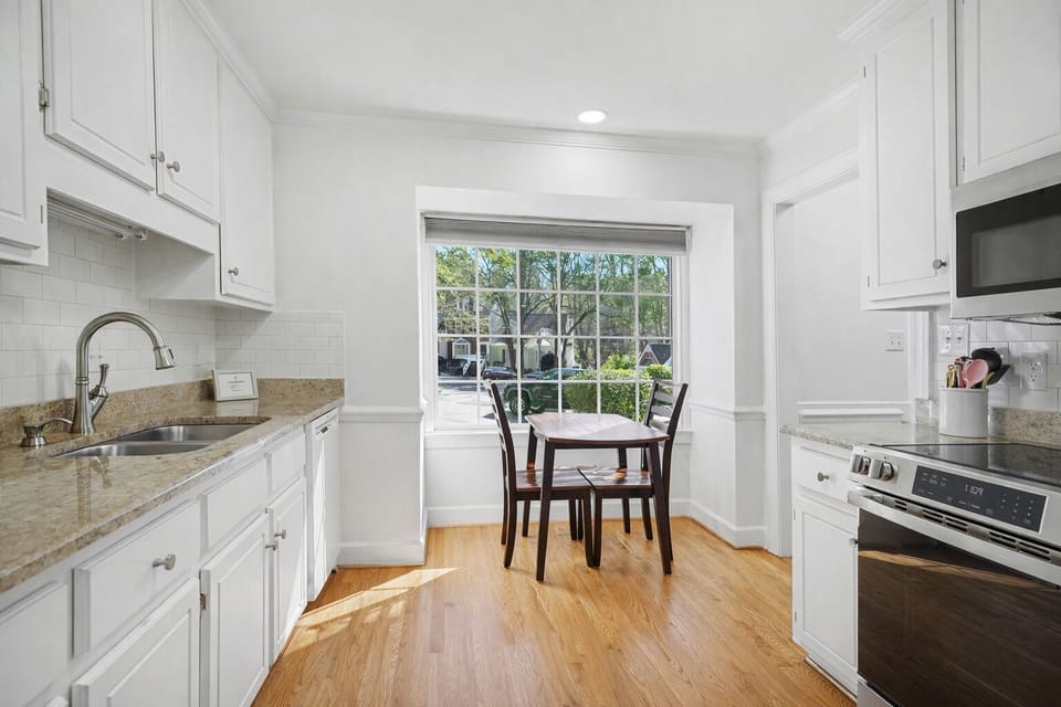 Full kitchen with breakfast nook.