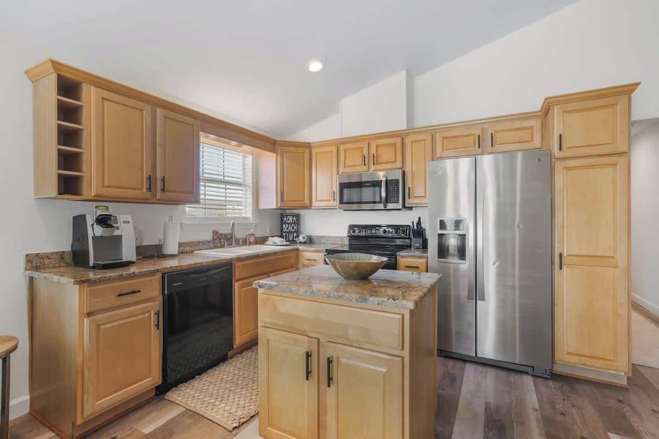 Fully stocked kitchen with stainless appliances