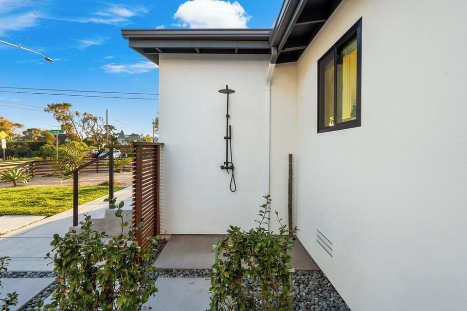 Outdoor shower and rinse off station