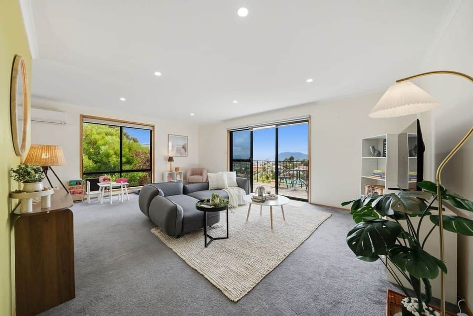 Spacious living room with comfortable seating and a relaxed, welcoming feel.