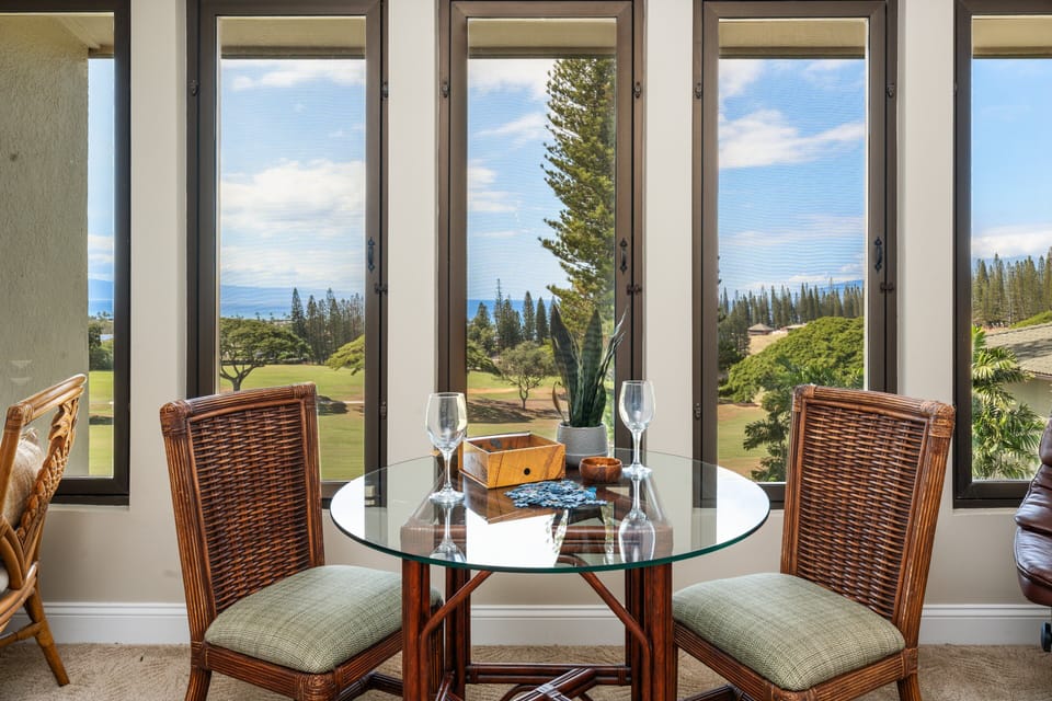 Enjoy beautiful scenery from this intimate glass‑top table—perfect for coffee, wine, or conversation.
