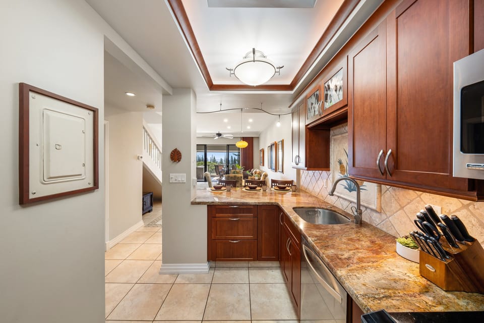 Prepare meals in style with this well‑designed kitchen that connects beautifully to the main living spaces.