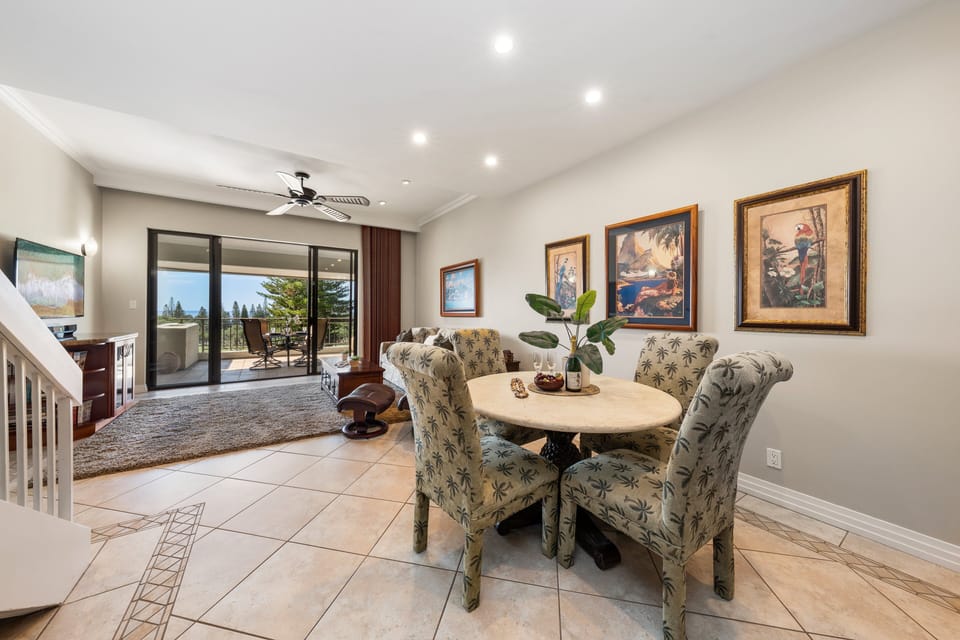 This inviting dining space connects seamlessly to the living room and outdoor terrace, making gatherings effortless.