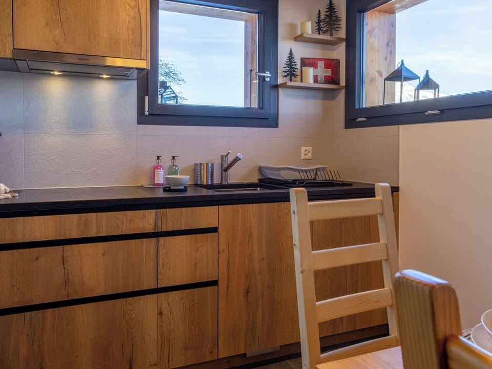 Wood, Kitchen, Interior Design, Furniture, Countertop, Cabinetry, Kitchen Appliance, Room, Major Appliance, Wood Stain