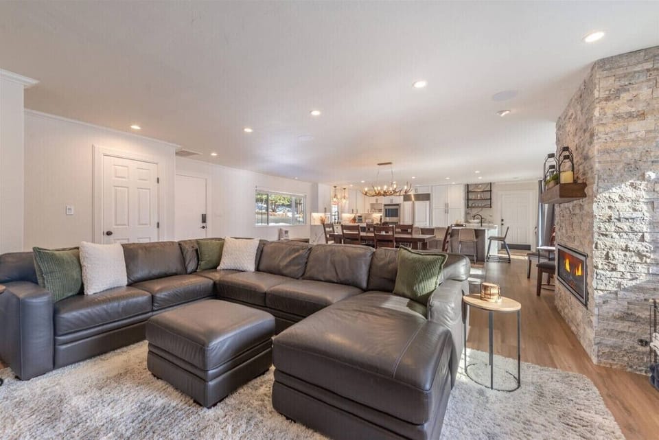 Spacious great room with combined living room, dining area & kitchen.