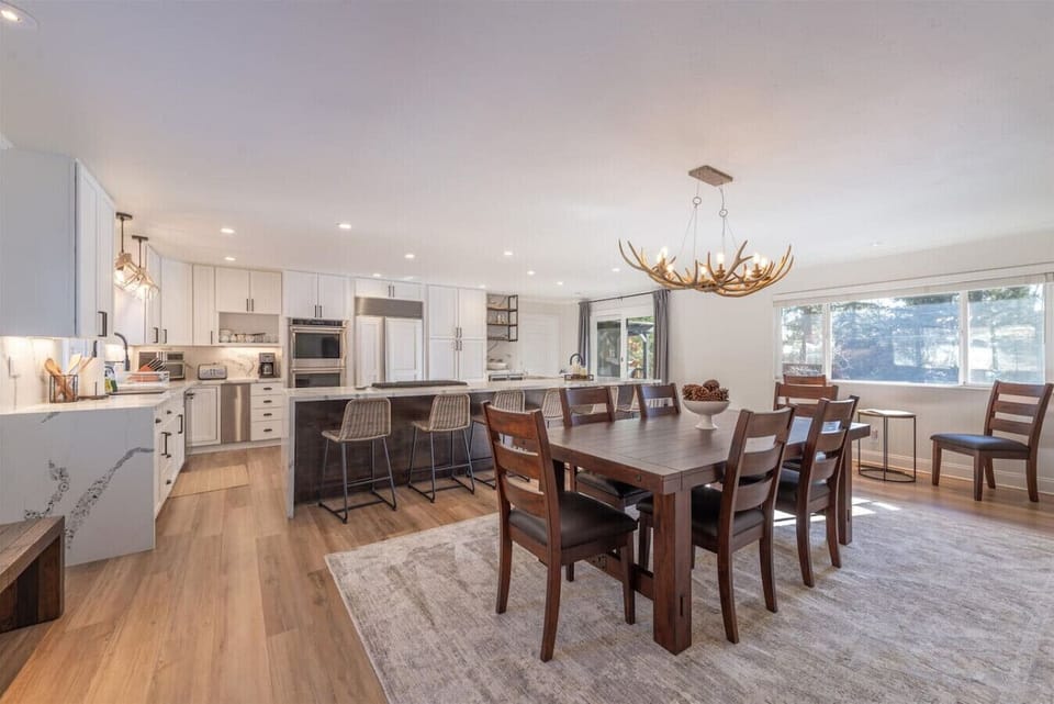 Spacious great room with combined living room, dining area & kitchen.
