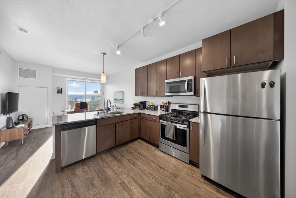 Fully stocked kitchen with full sized appliances