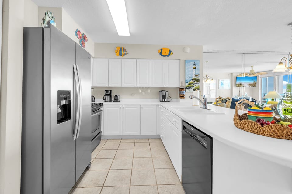 Cook your favorite meals in this bright, fully-equipped kitchen with stainless steel appliances and plenty of counter space.