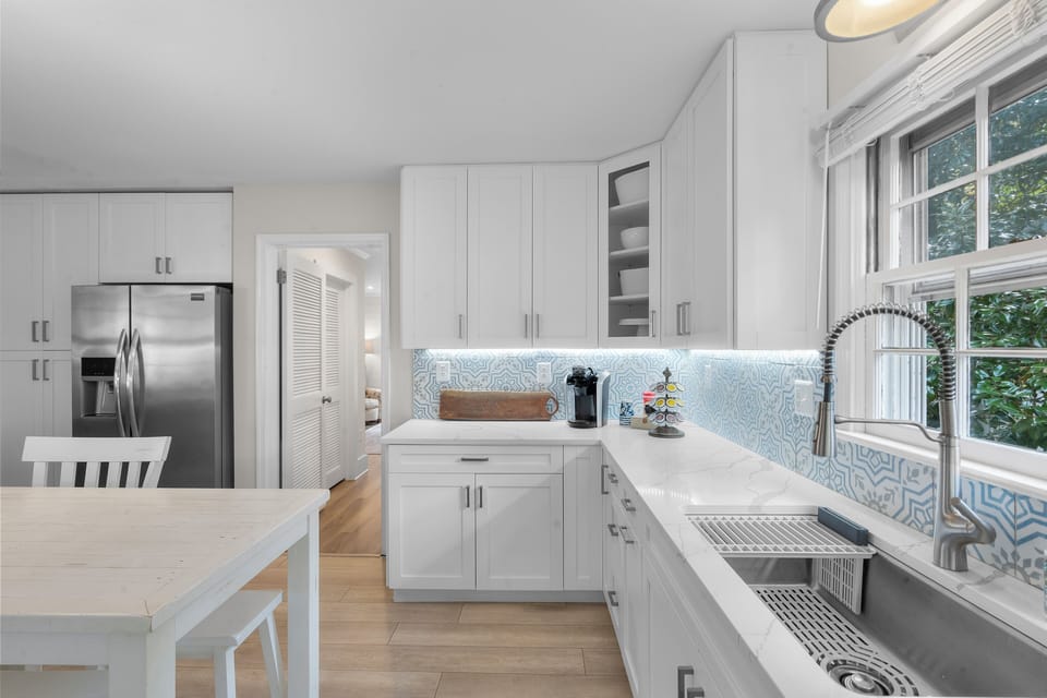 Kitchen with entrance to first-floor bedroom