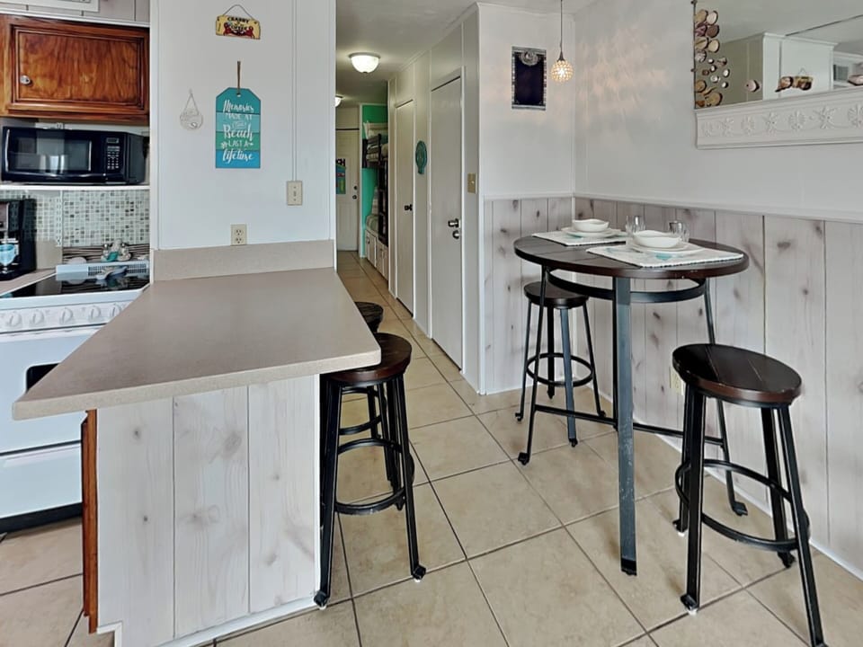 Dining Area - Countertop Seating for 2 + Table Seating for 2