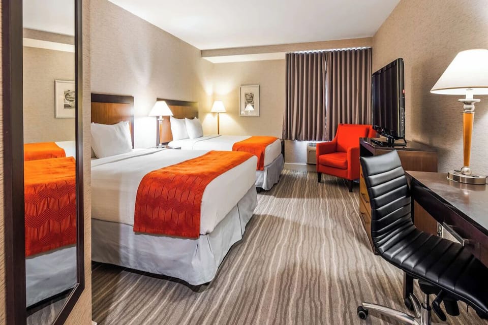 Stretch out with comfy seating, work desk, and restful beds.