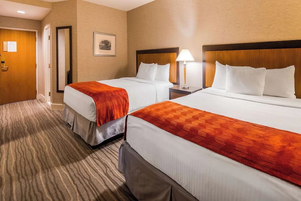 Drift off on plush pillows after a long day exploring.