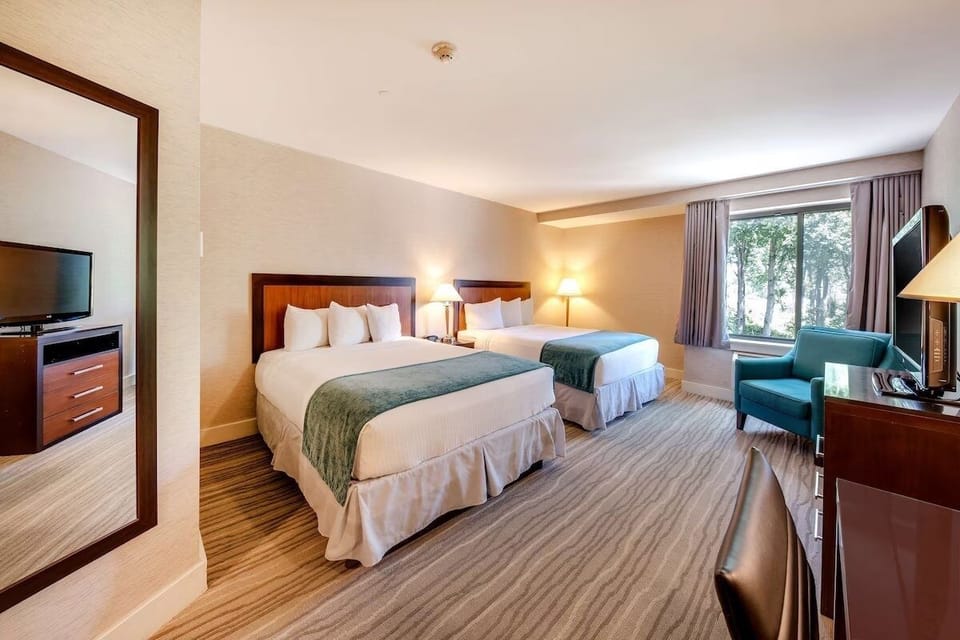 Gather everyone comfortably with two queen beds and roomy layout.