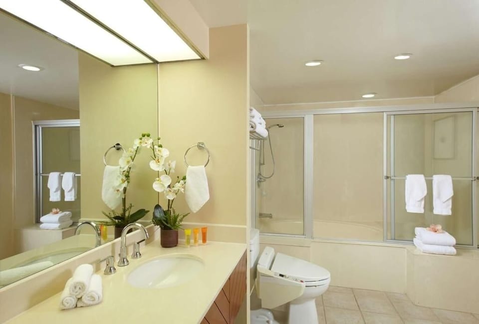 Refresh in a bright bathroom with ample counter space.