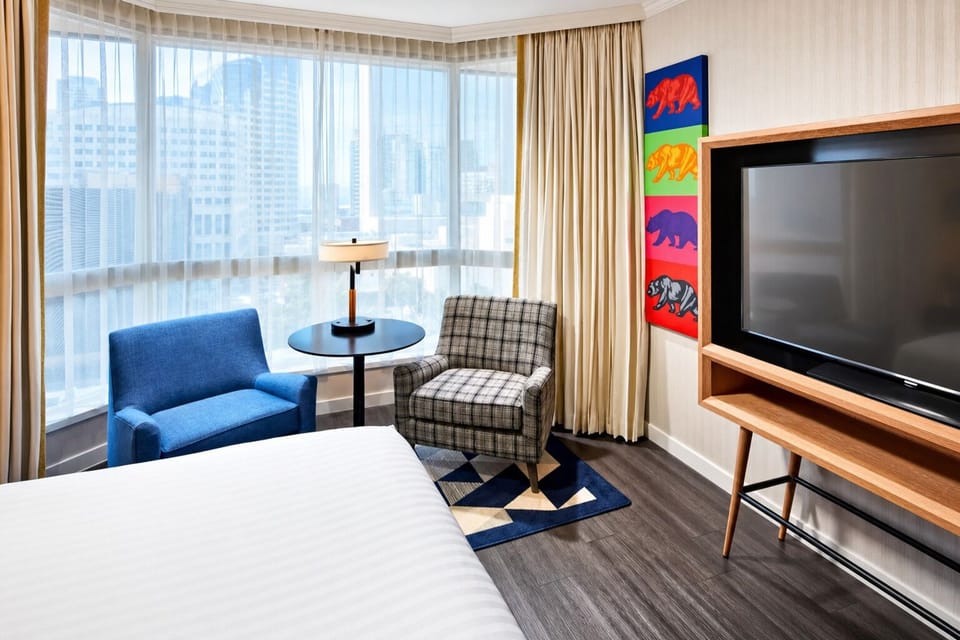 Kick back with a movie and skyline views beyond.