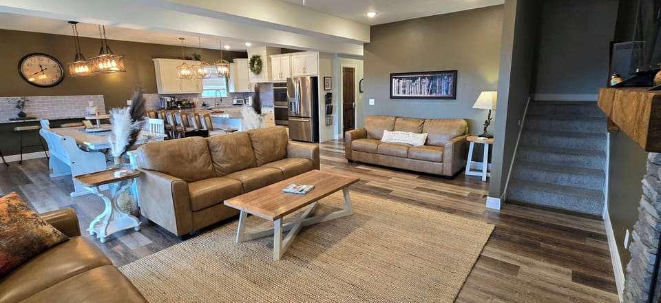 Open concept living, kitchen, dining area for catching up with everyone!