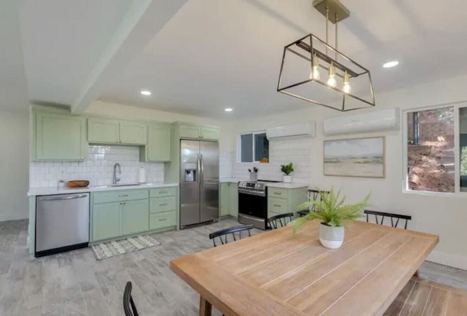 Open kitchen with stainless steel appliances