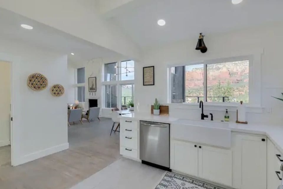 Large modern sink with red rock views from the window