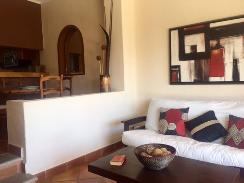 Chic, sunlit lounging with a modern coastal vibe perfect for post-beach relaxation.