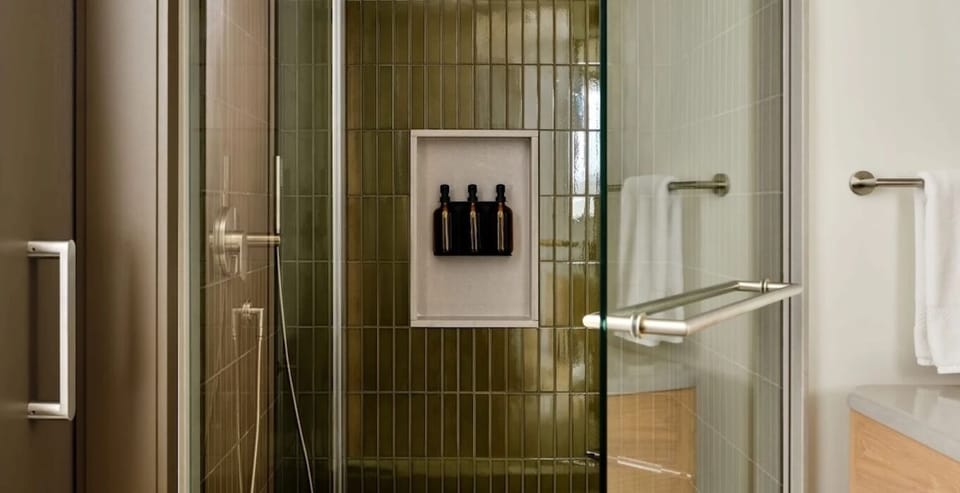 Start the day with a revitalizing shower in polished tile.