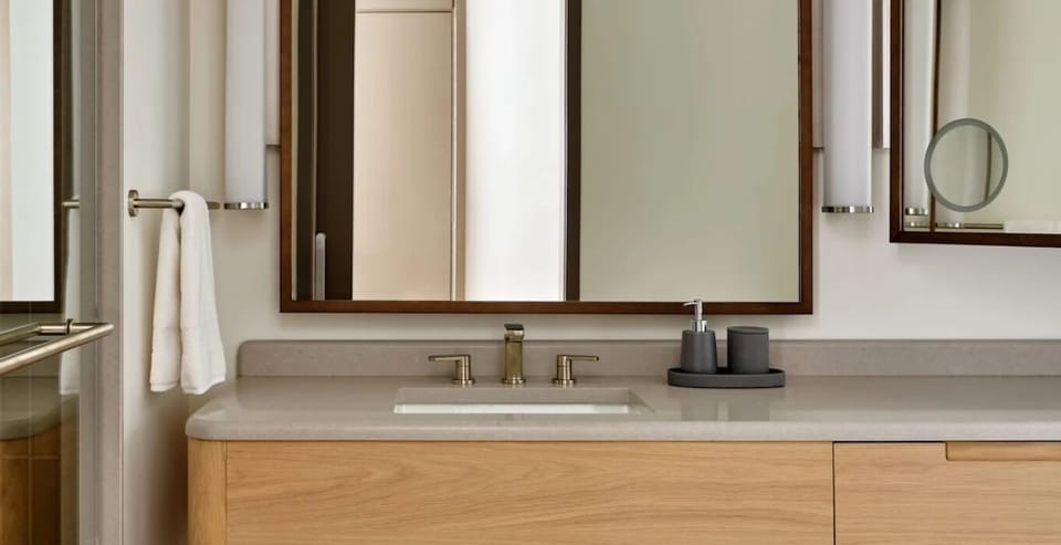 Get ready with generous counter space and glowing mirrors.