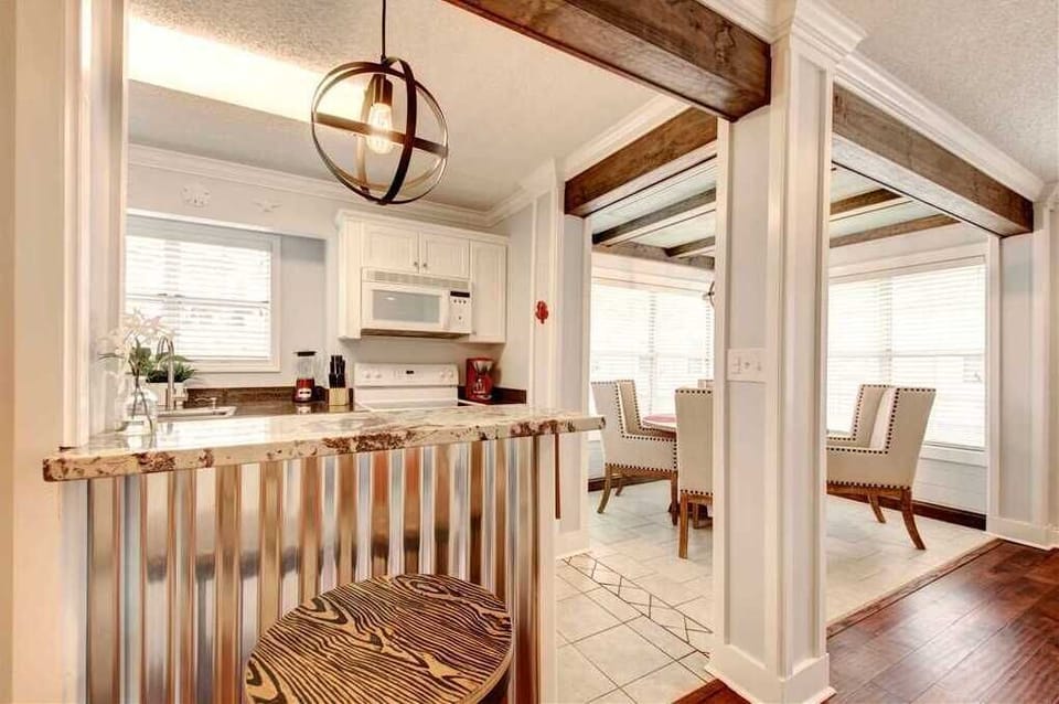 View of kitchen and dining area.