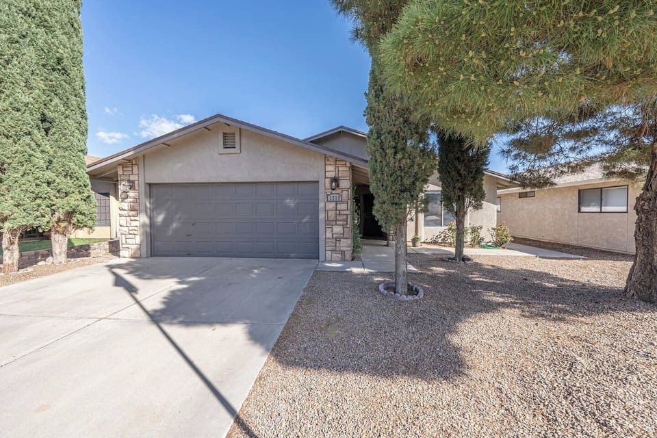 Front exterior of the home with driveway parking and easy entry.