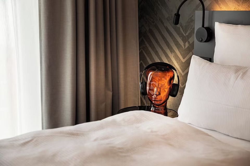 Drift off with thoughtful bedside lighting and modern design touches