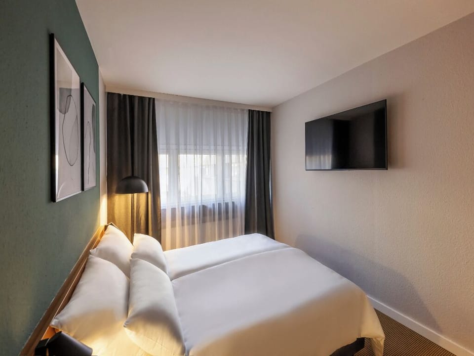 Stretch out comfortably with a full-room view and TV.