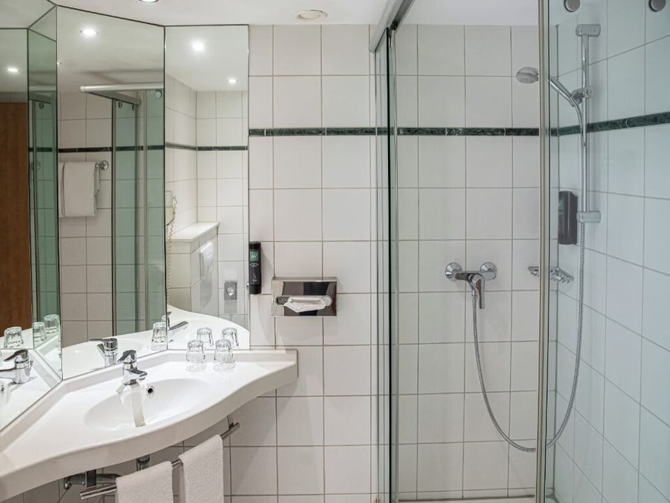 Start your morning with bright mirrors and a spacious vanity.