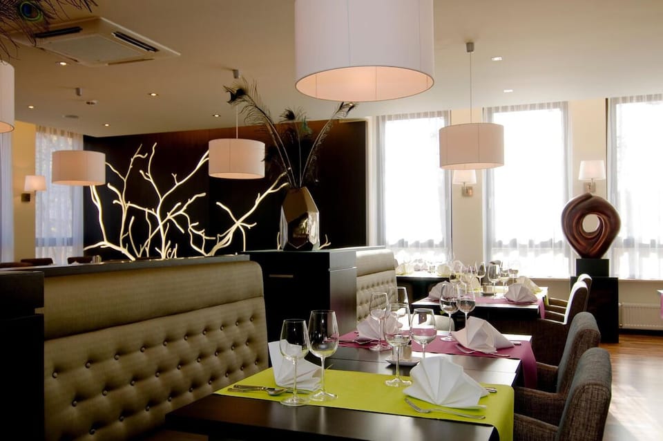 Toast the evening with refined table service and cozy seating.