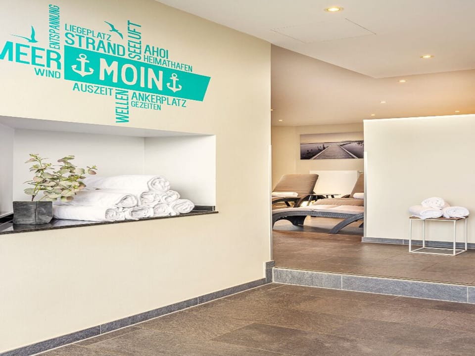 Sink into calm with plush towels and tranquil spa seating