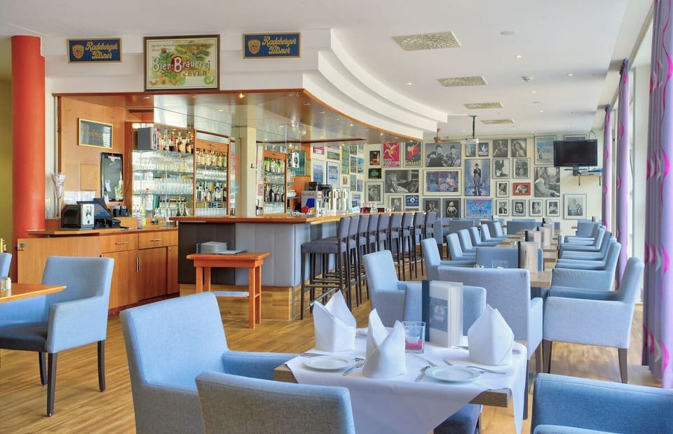 Unwind with a nightcap in the stylish, sociable bar lounge.