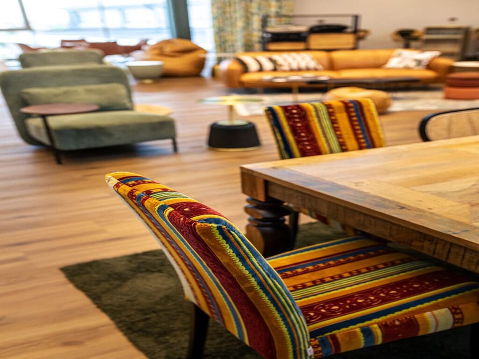 Gather for drinks and conversation in a vibrant, relaxed lounge.