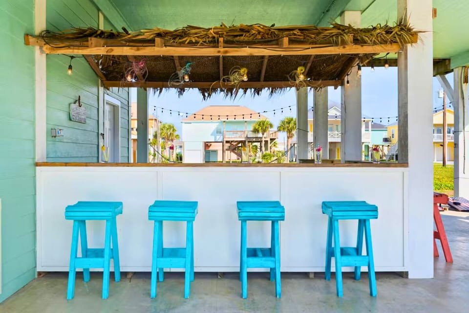 Salt Air & Sunset Views. 🍹 Step out onto the deck for a breath of fresh air. Whether you’re grilling, lounging, or gathering around the fire pit, this is where the best vacation memories are made.