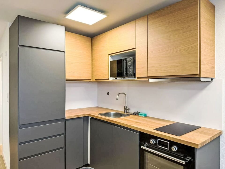 Kitchen, Cabinetry, Kitchen Appliance, Countertop, Furniture, Wood, Interior Design, Major Appliance, Flooring, Home Appliance