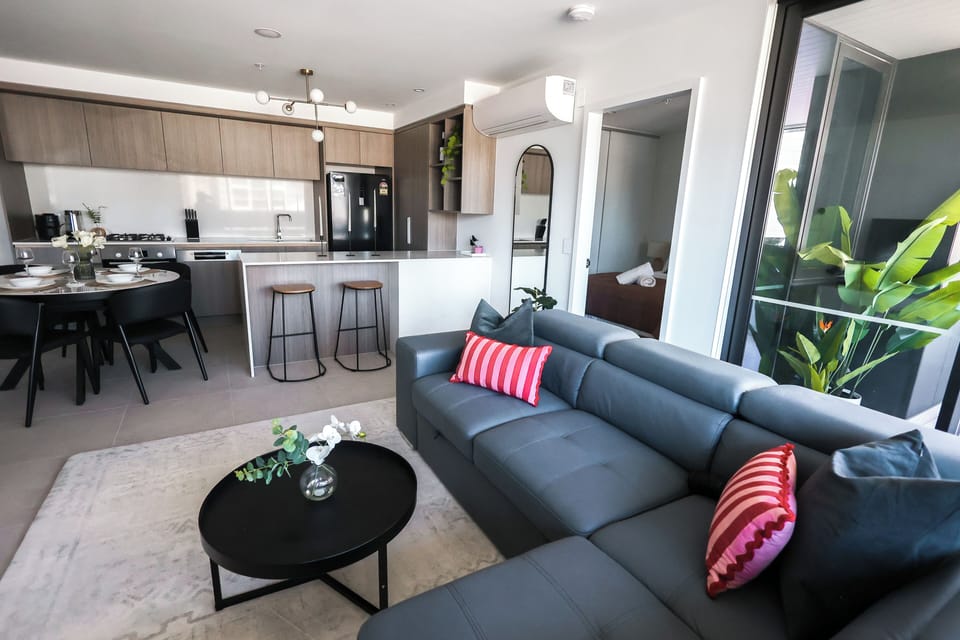 Enjoy a seamless flow from the designer kitchen to the comfortable lounge and private balcony.