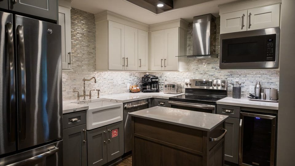 Fully equipped kitchen with granite countertops and full-size appliances for easy family meals.