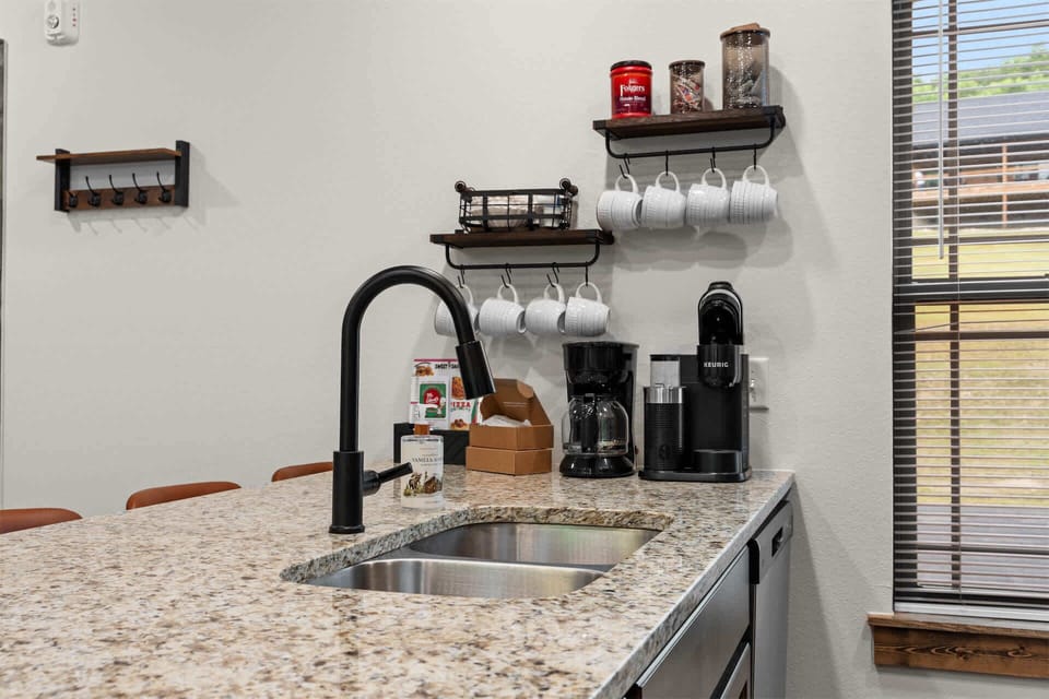The inviting kitchen offers ample space & all the comforts of home​
