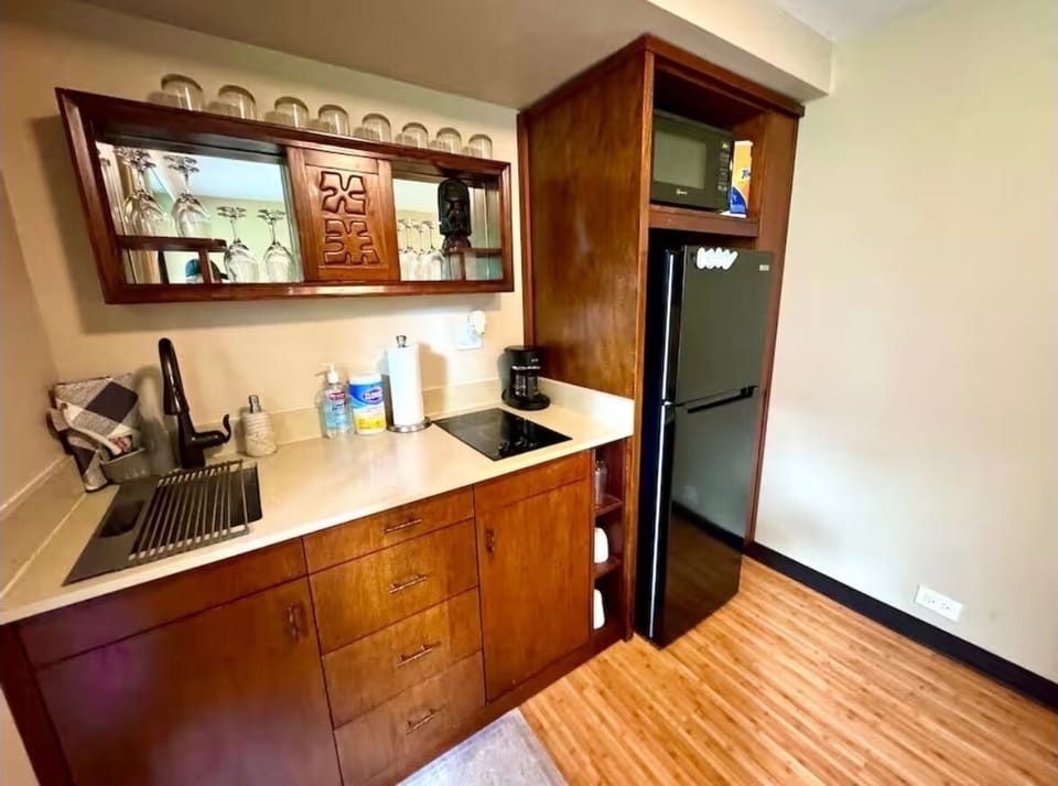 Kitchen is fully stocked for you to cook meals at home. 2 burner stove top. 
