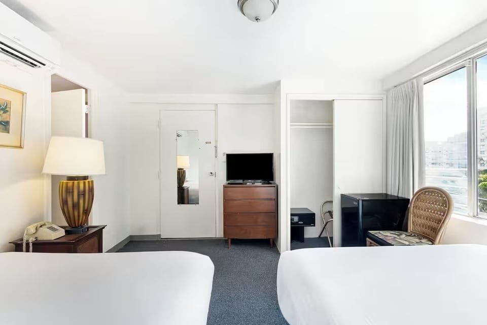 Recharge after exploring in a simple, quiet sleeping space.