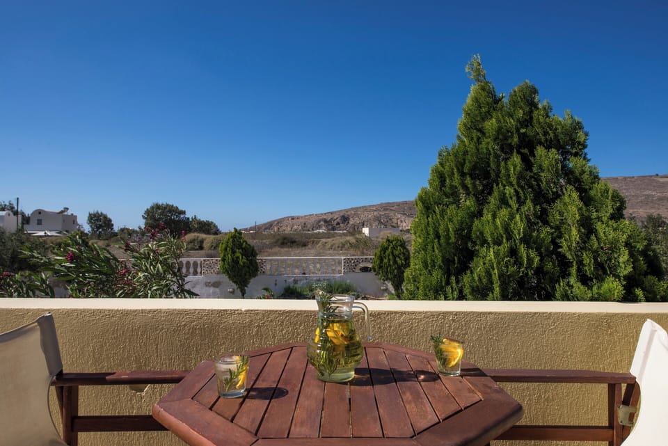 Private balcony with table and chairs