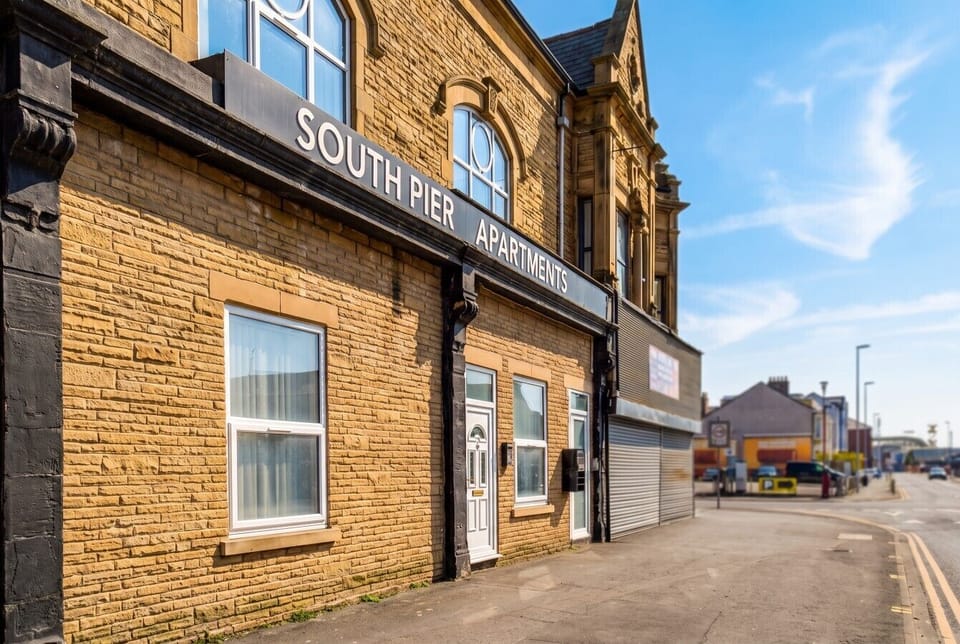 Arrive easily at the welcoming South Pier Apartments entrance on Bond Street.