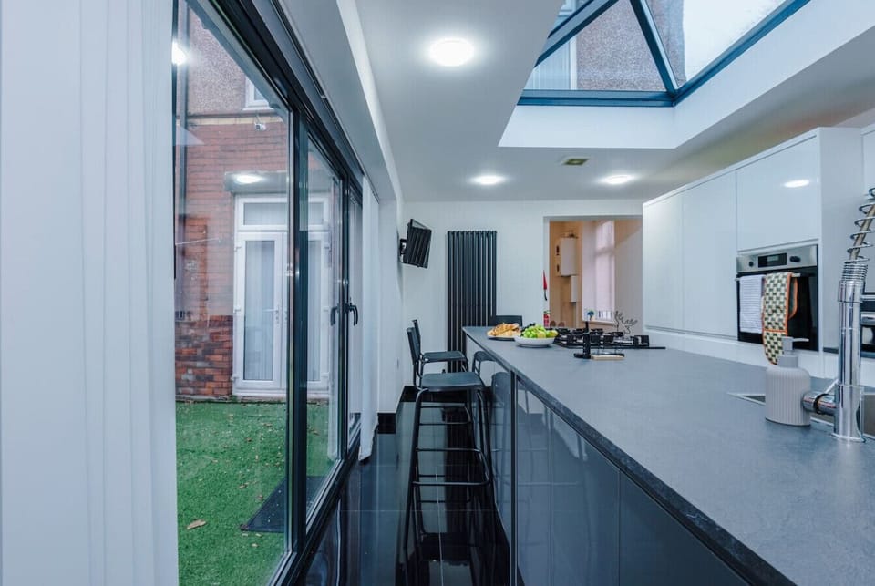The kitchen island provides a central spot for preparing food and eating together.